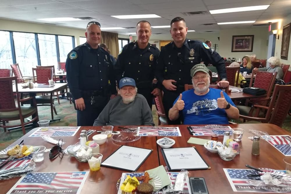 Police officers visit for an event at Willow Creek Senior Living in Elizabethtown, Kentucky.