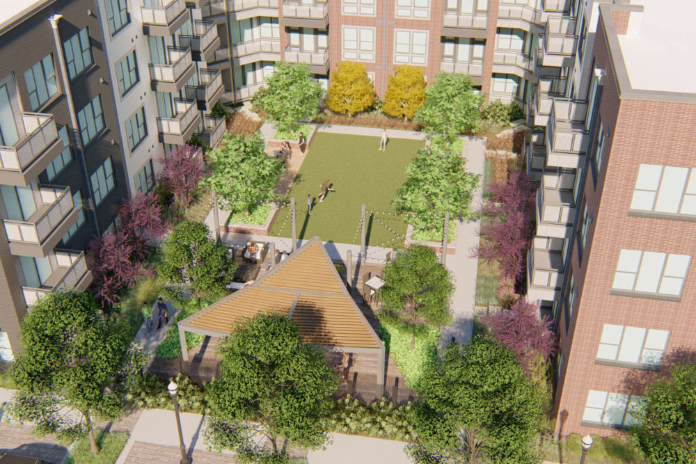 Aerial rendering of the exterior courtyard between resident buildings at Olympus on Broadway in Carrollton, Texas