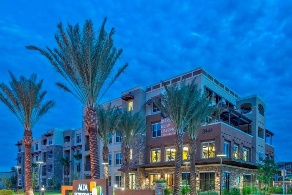 Exterior of Luxe Scottsdale Apartments at dusk in Scottsdale, Arizona