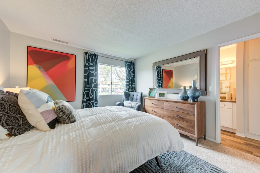 Model bedroom next to bathroom and extra storage at Sofi Ventura in Ventura, California