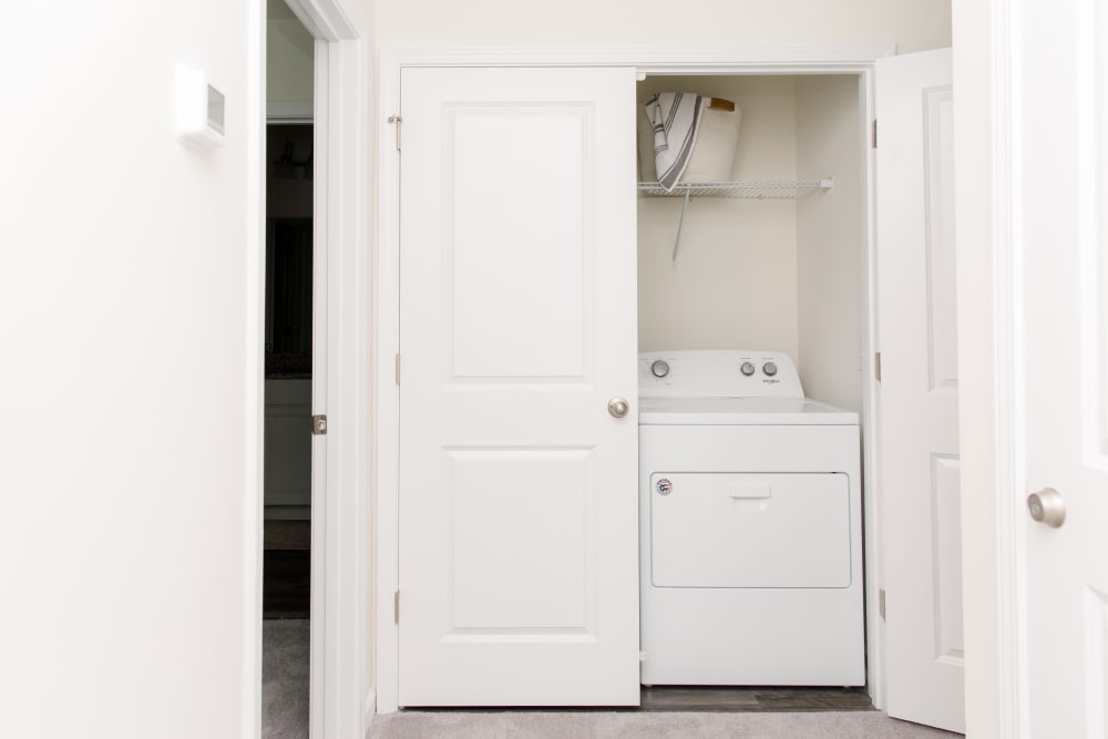 Washer and dryer full-sized at Artisan Living Bella Citta in Davenport, FL