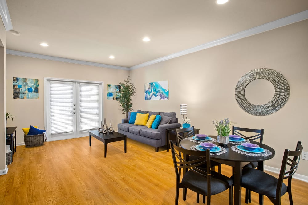 Living room with view of dining room at The Vintage
