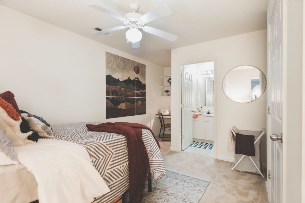 Bedroom with private bathroom at Sunchase Apartments in Greenville, North Carolina