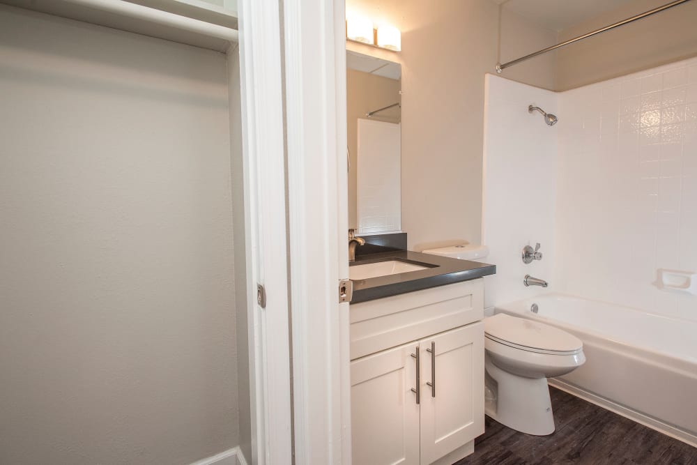 Bathroom with an oval tub at Regency Plaza Apartment Homes in Martinez, California