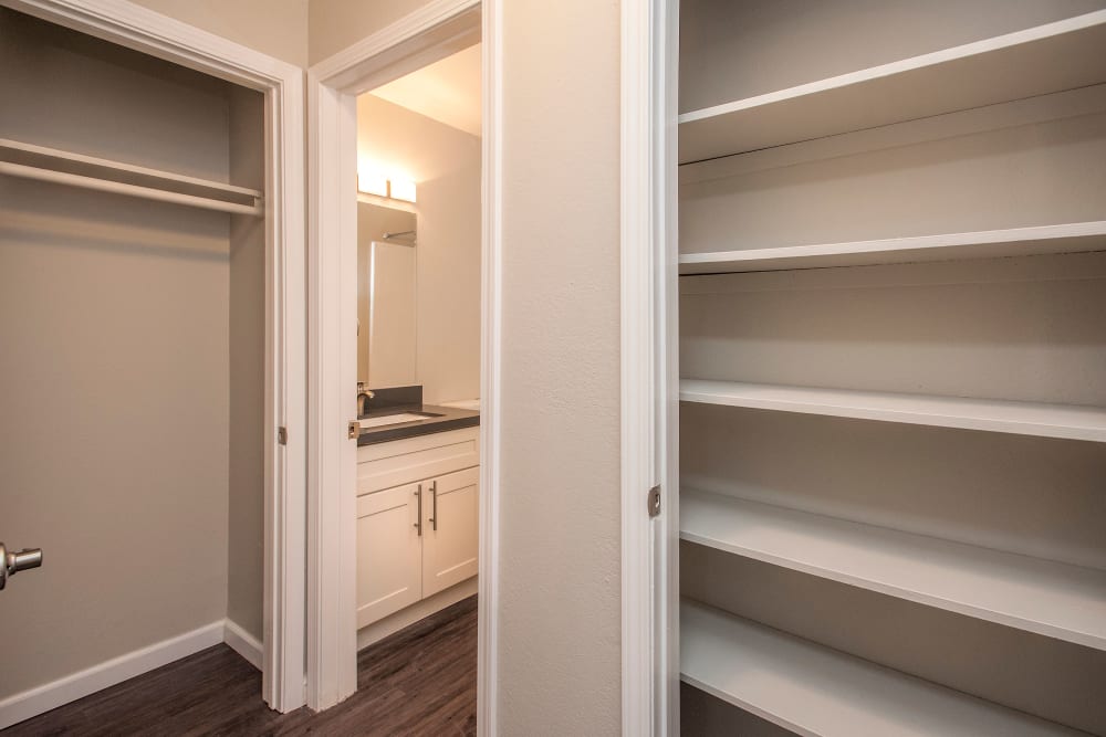 Master bathroom with plenty of storage space at Regency Plaza Apartment Homes in Martinez, California
