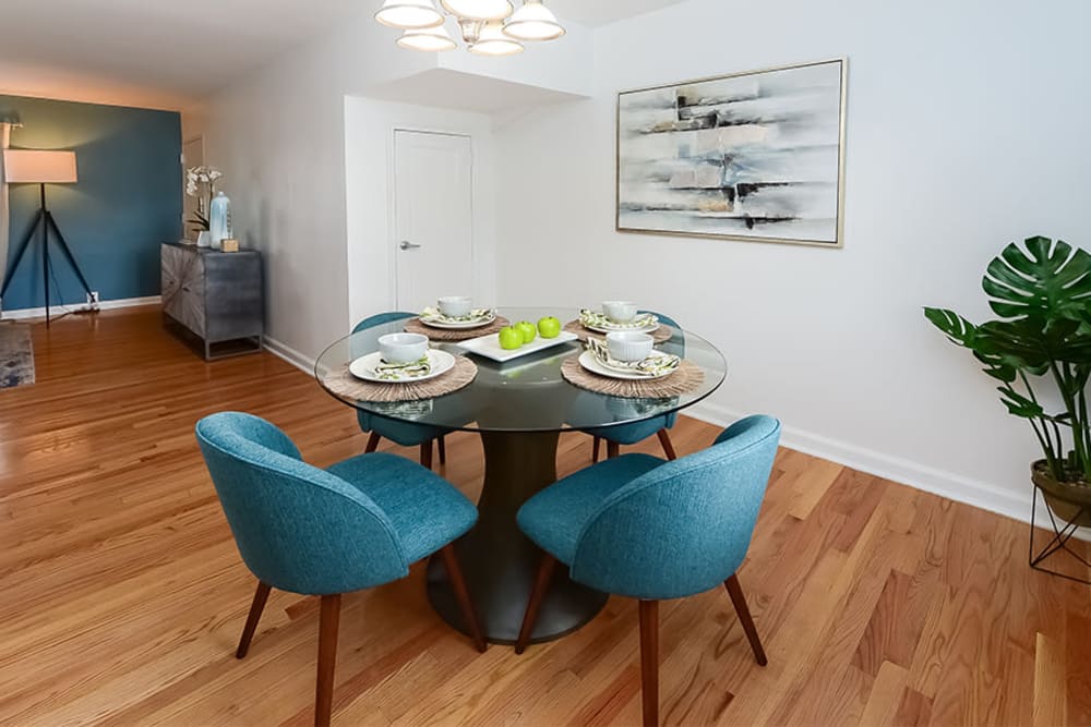 Dining room with hardwood floors at Elmwood Village Apartments & Townhomes in Elmwood Park, New Jersey