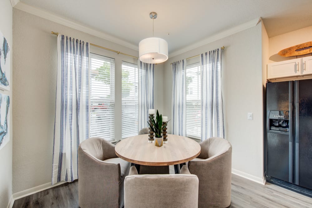 Open floor plan living and dining areas at Ingleside Apartments in North Charleston, South Carolina