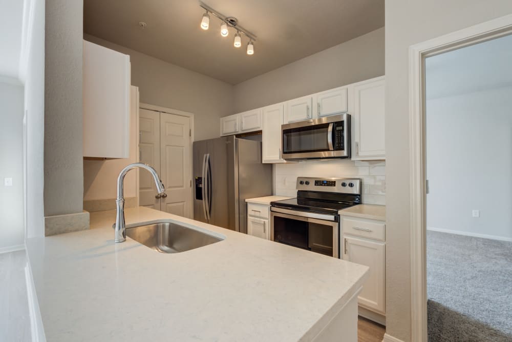 Bright kitchen with modern appliances Ingleside Apartments in North Charleston, South Carolina