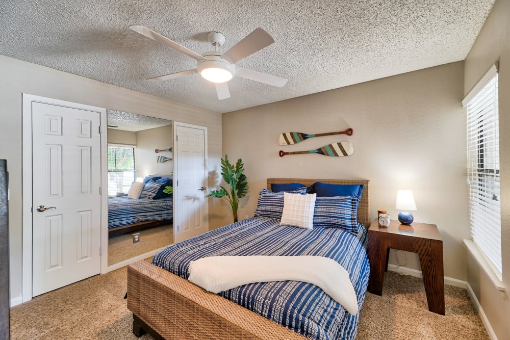 Bedroom with a nice ceiling fan to keep you cool at Greenspoint at Paradise Valley in Phoenix, Arizona