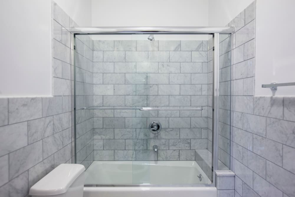 Large modern, main bathroom at The Sutton Collection in New York, New York