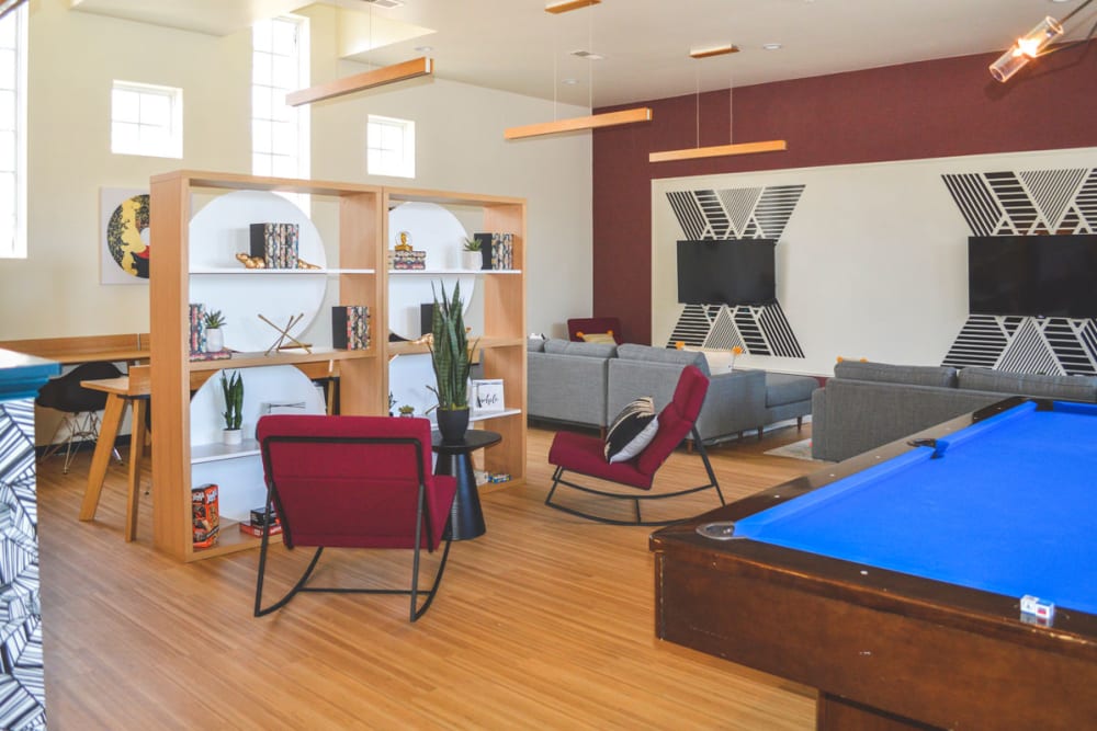Clubhouse and pool table at Sunchase Apartments in Greenville, North Carolina