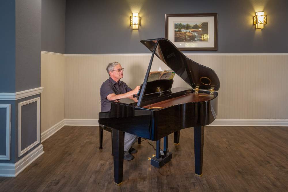 Piano and music playing space at Harmony at Five Forks in Simpsonville, South Carolina