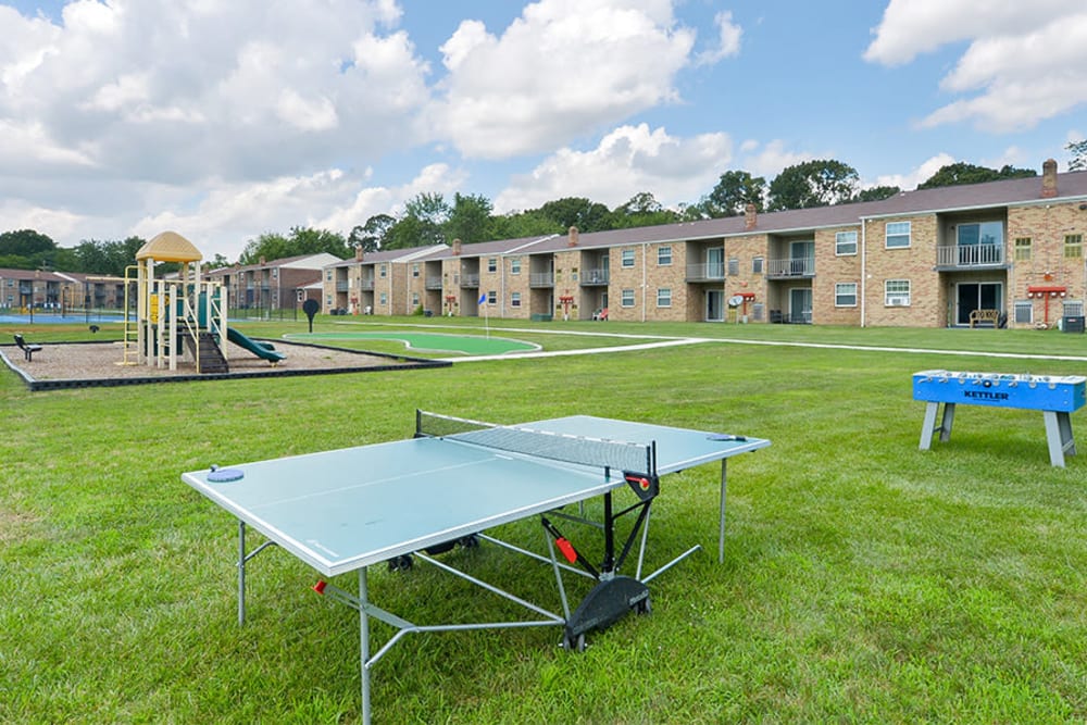Outdoor games and playground at The Fairways Apartment Homes in Blackwood, New Jersey