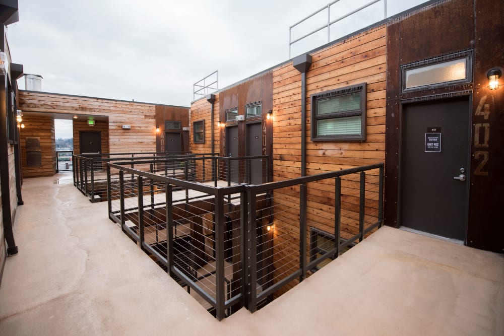 Walkway between upper-floor units at Brooklyn Yard in Portland, Oregon