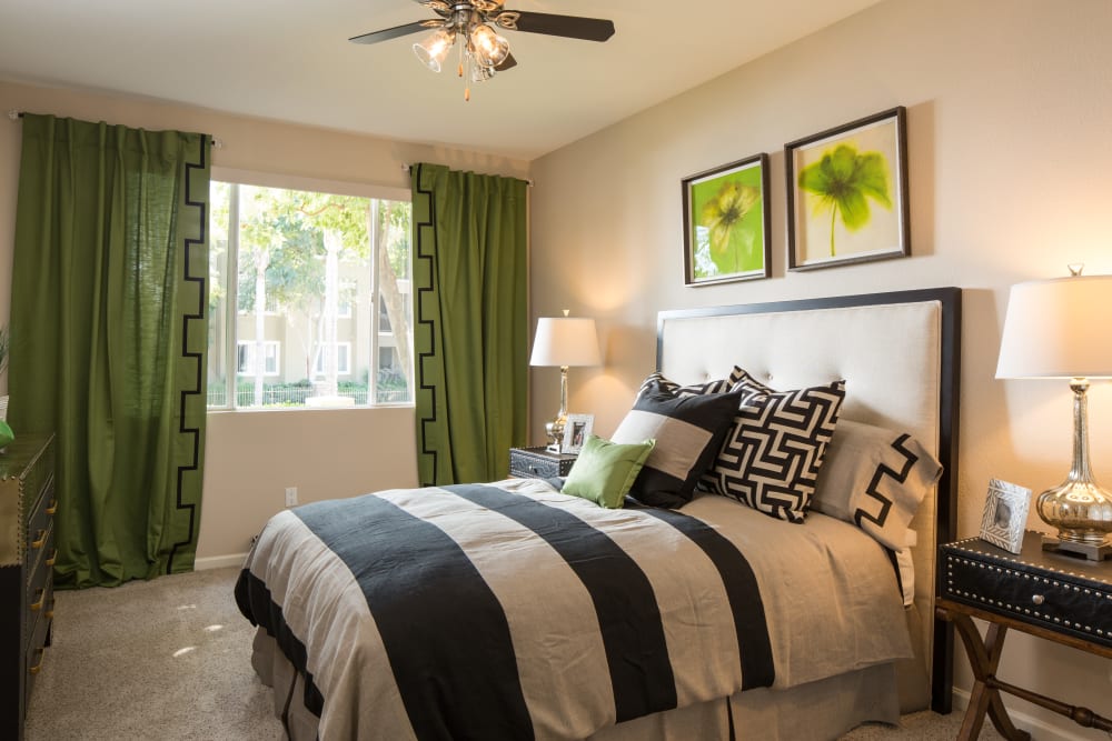 Main bedroom with a large bedroom at Alicante Apartment Homes in Aliso Viejo, California