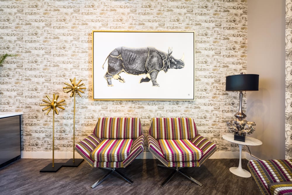 Clubhouse seating area with art on the wall at 4127 Arcadia in Phoenix, Arizona