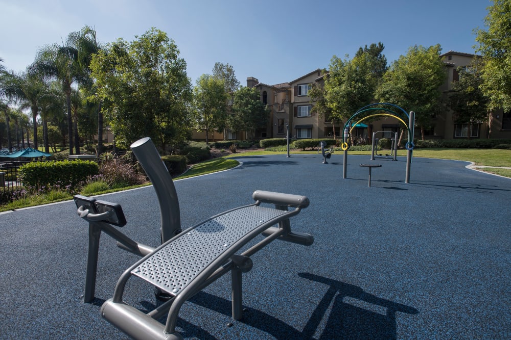 Outdoor fitness area for summer workout sessions at Esplanade Apartment Homes in Riverside, California
