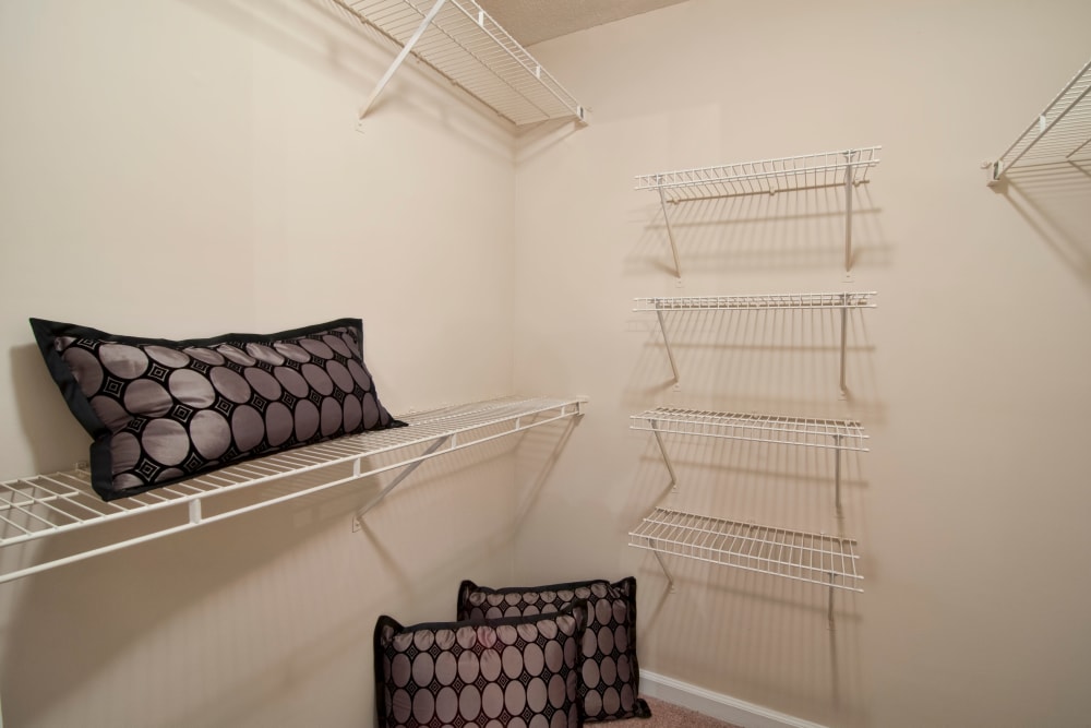 A large spacious closet with shelves In an apartment at Bellingham Apartment Homes in Marietta, Georgia
