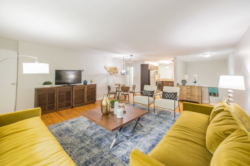Living room featuring open floor plan format highlights lots of space in an apartment at Cherokee Apartments in Philadelphia, Pennsylvania