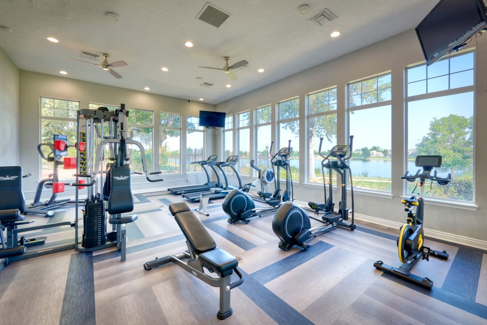 Clean, modern community gym at Promenade at Hunter's Glen Apartments in Thornton, Colorado
