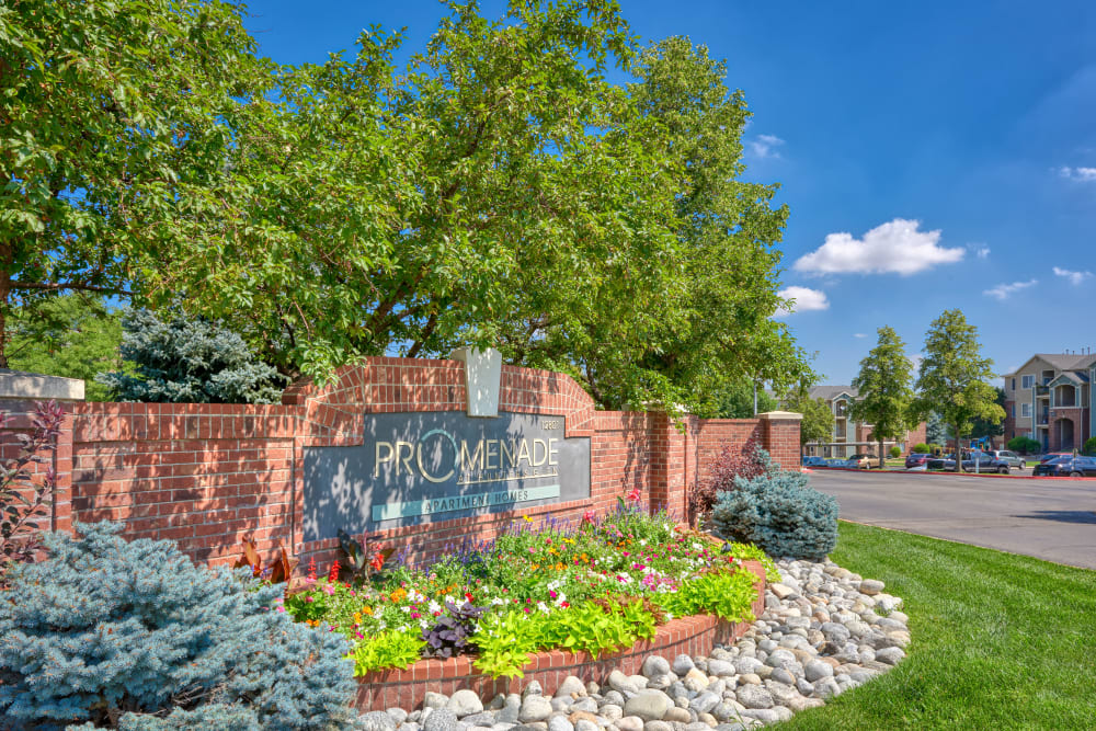 The front monument sign at Promenade at Hunter's Glen Apartments in Thornton, Colorado