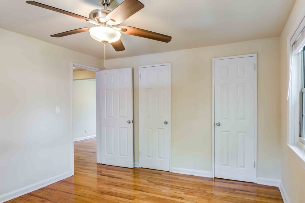 Ceiling fan in the bedroom with hardwood floors in an apartment at Haven New Providence in New Providence, New Jersey