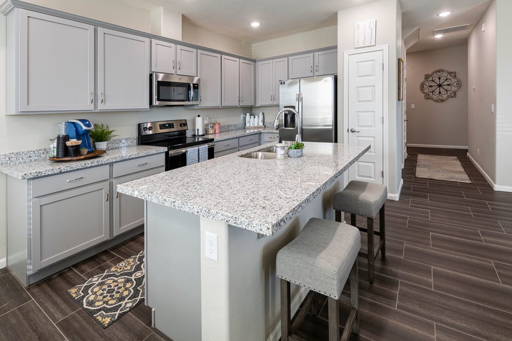 Spacious kitchen with a breakfast bar at BB Living at Eastmark in Mesa, Arizona