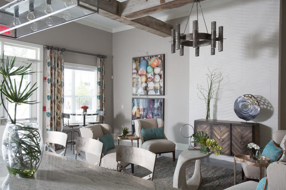Clubhouse lounge with plenty of seating at Ansley Commons Apartment Homes in Ladson, South Carolina