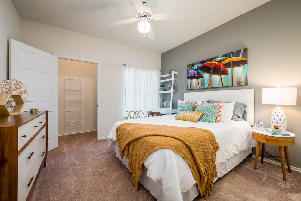 Well decorated model bedroom at Rockbrook Creek in Lewisville, Texas