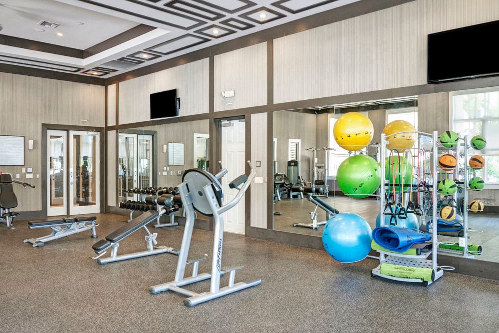 High ceilings are a feature of this fitness center at City Center on 7th Apartment Homes in Pembroke Pines, Florida