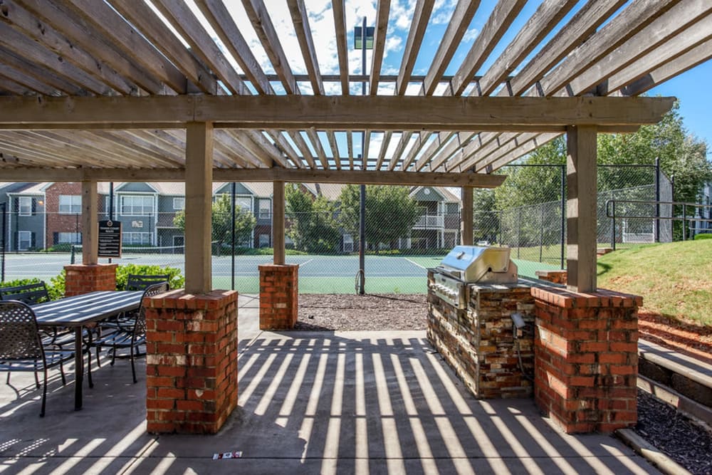Outdoor barbecue and picnic area with shade gazebo  at Eastwood Village in Stockbridge, Georgia