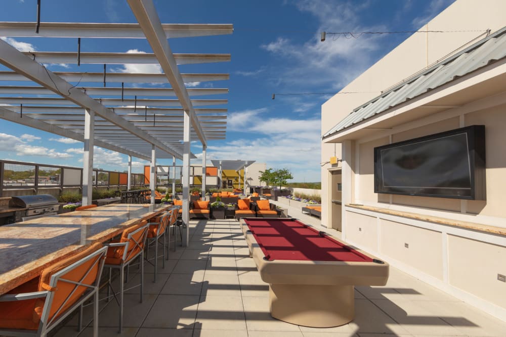 Rooftop bar and pool table at Palette at Arts District in Hyattsville, Maryland