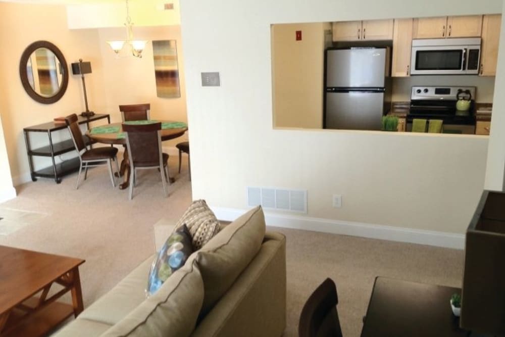 View of kitchen and dining area from a living room in an apartment at The Heights At Marlborough in Marlborough, Massachusetts