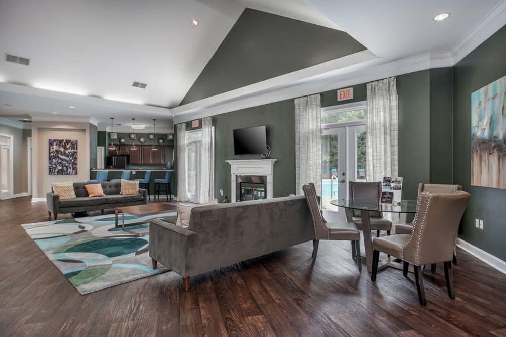 Modern decor and hardwood floors in the clubhouse at Meadow View in College Park, Georgia