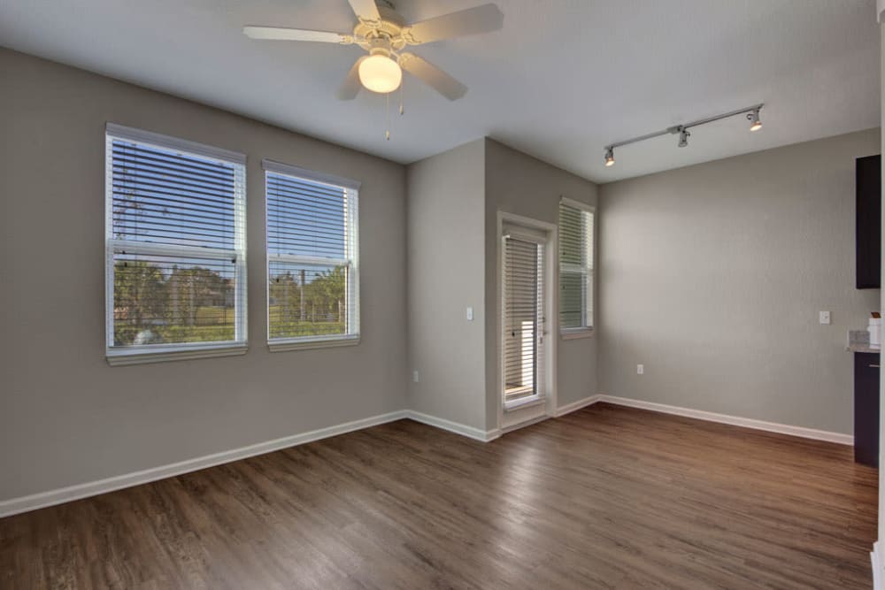 Room featuring hardwood floors and ceiling fan at Linden on the GreeneWay in Orlando, Florida
