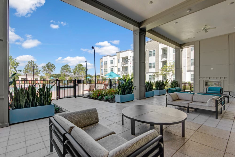 Outdoor sitting area by Clubhouse at Linden on the GreeneWay in Orlando, Florida