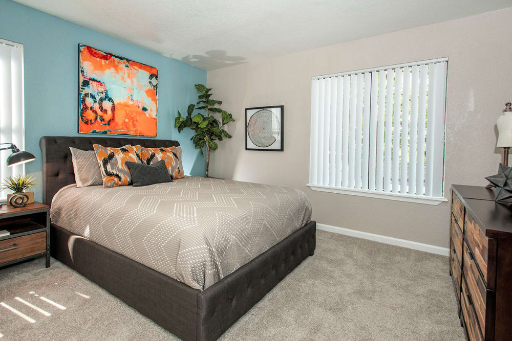Main bedroom with plush carpeting at Sandpiper Village Apartment Homes in Vacaville, California