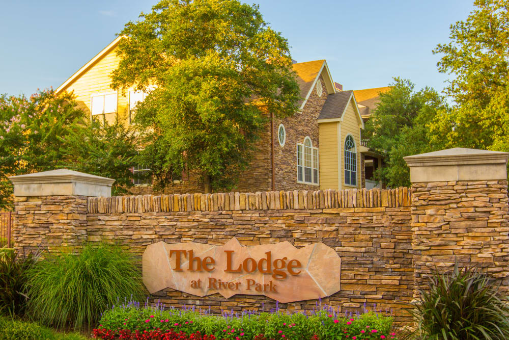 Front entrance sign at The Lodge at River Park in Fort Worth, Texas