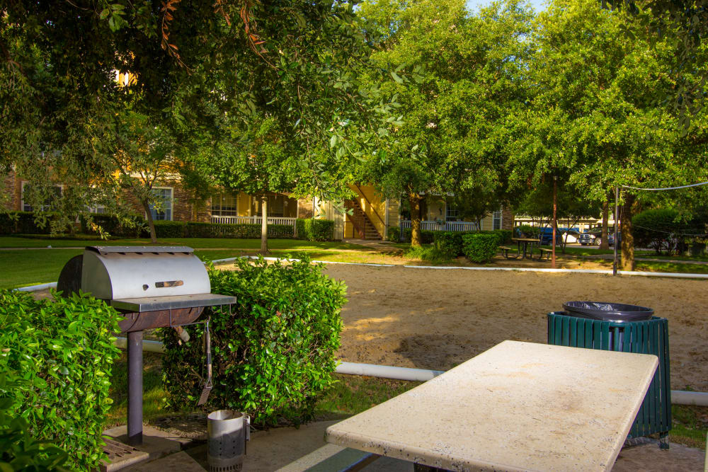Outdoor barbecue on the water for residents at The Lodge at River Park in Fort Worth, Texas