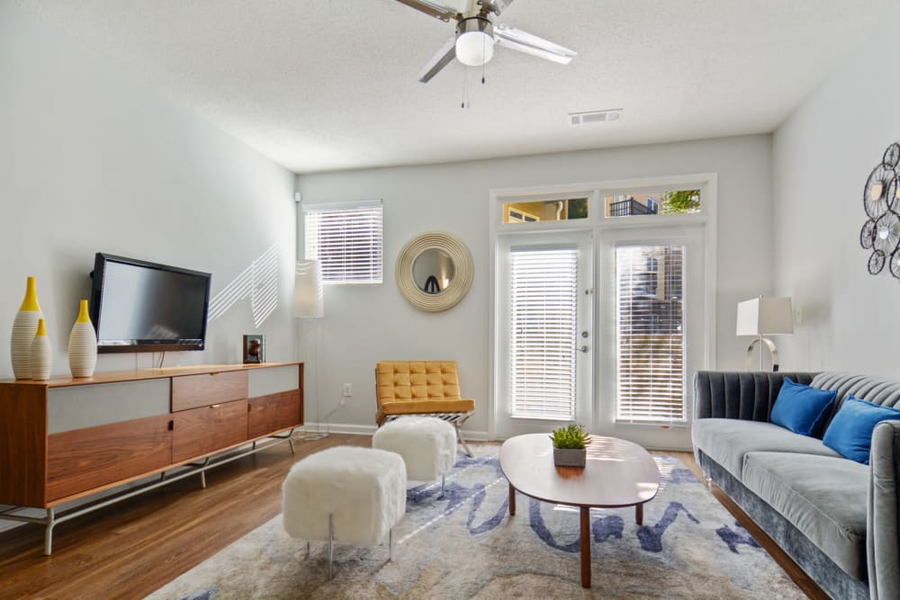 Ceiling fan an modern furnishings in the living area of a model home at Ellington Midtown in Atlanta, Georgia