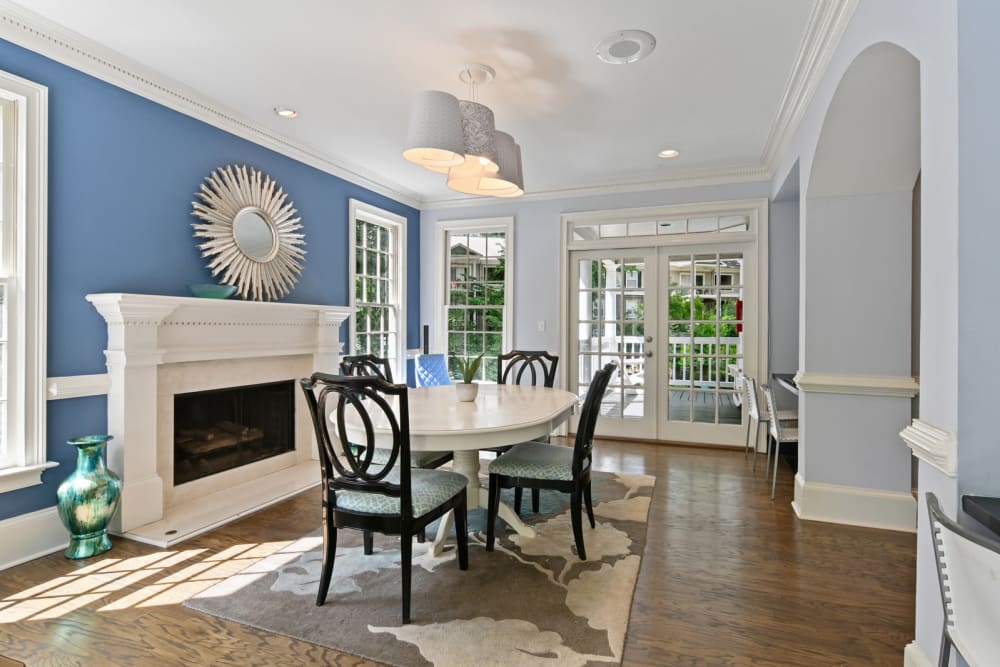 Clubhouse meeting area with a fireplace at Crest at Riverside in Roswell, Georgia