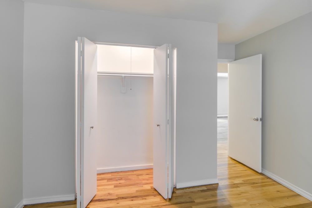 Bedroom with walk in closet at Summit and Birch Hill Apartments