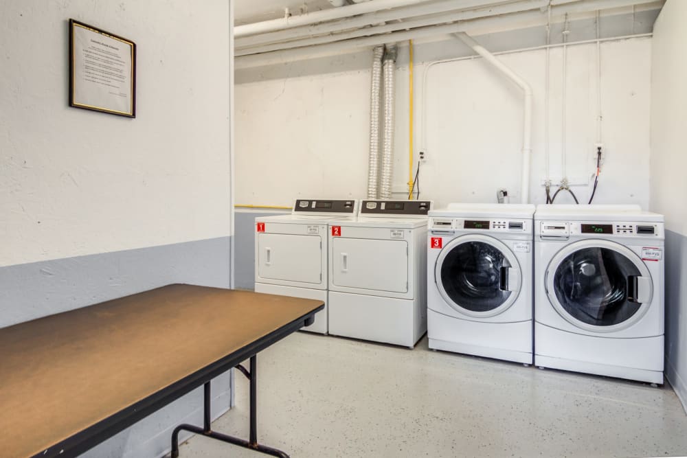 Laundry room at Summit and Birch Hill Apartments