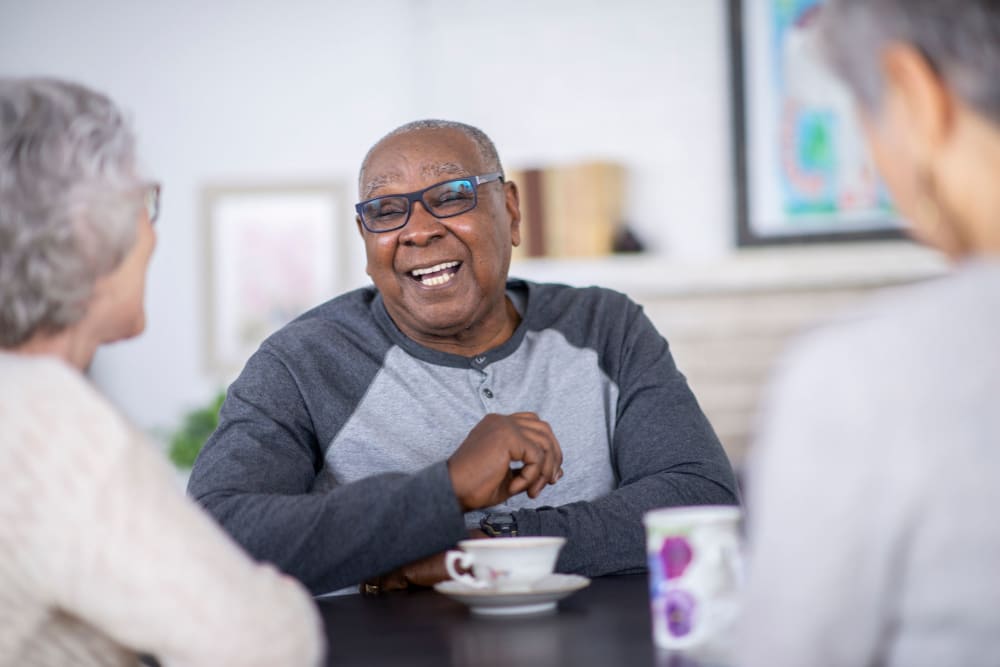 Resident enjoy tea at Ramsey Village Continuing Care in Des Moines, Iowa