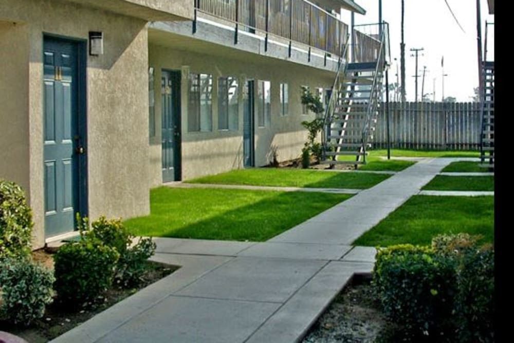 Outdoor walkways at El Potrero Apartments in Bakersfield, California