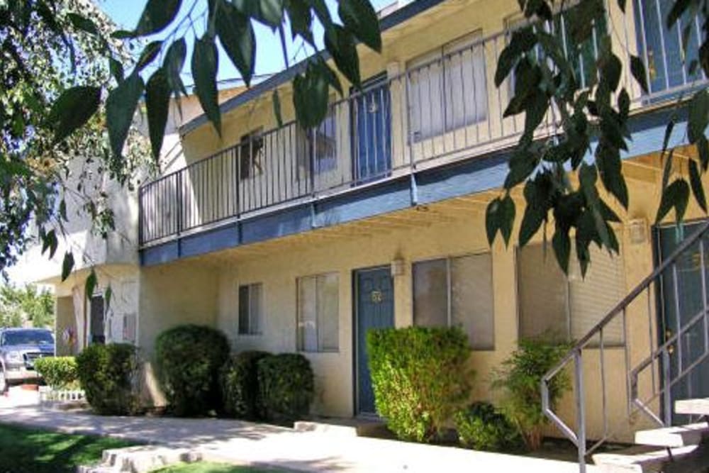 Facility exterior and landscaping at El Potrero Apartments in Bakersfield, California