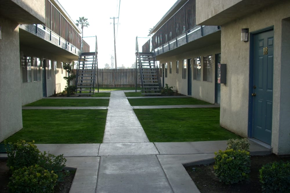 Sidewalks between housing at El Potrero Apartments in Bakersfield, California