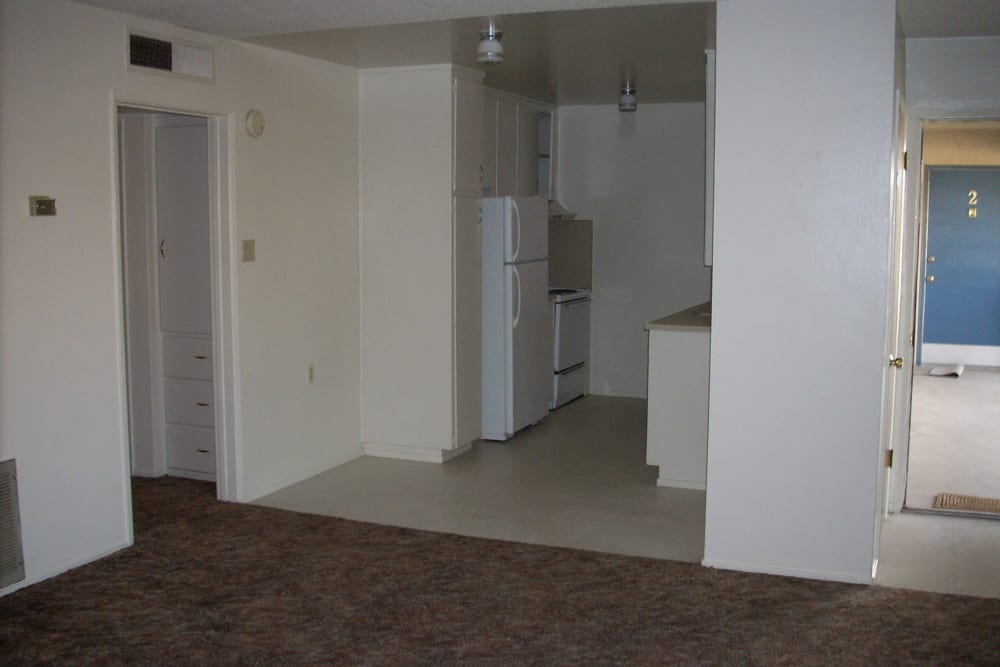 Hardwood flooring leading up to the kitchen at Highland View Court in Bakersfield, California