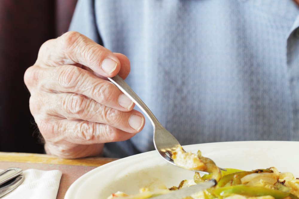 Resident eating at Ramsey Village Continuing Care in Des Moines, Iowa