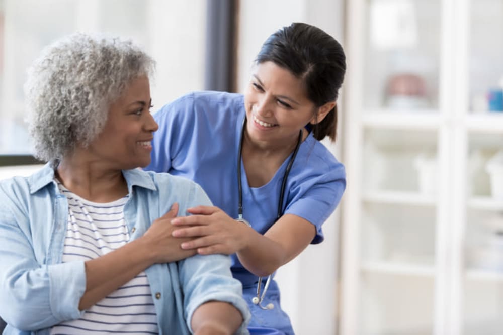 Staff helping a resident at Harmony at Bellevue in Nashville, Tennessee
